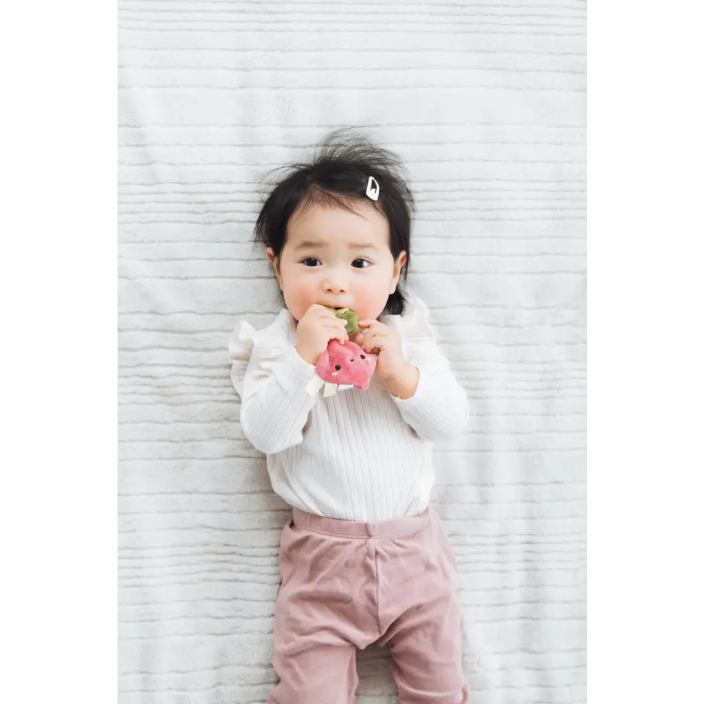 Pink plush elephant baby teether with crinkle design and beaded ring