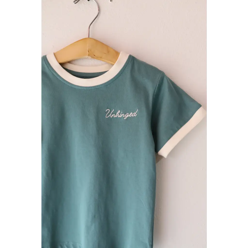 Teal Unbothered ringer tee, perfect for kids, made from soft organic cotton