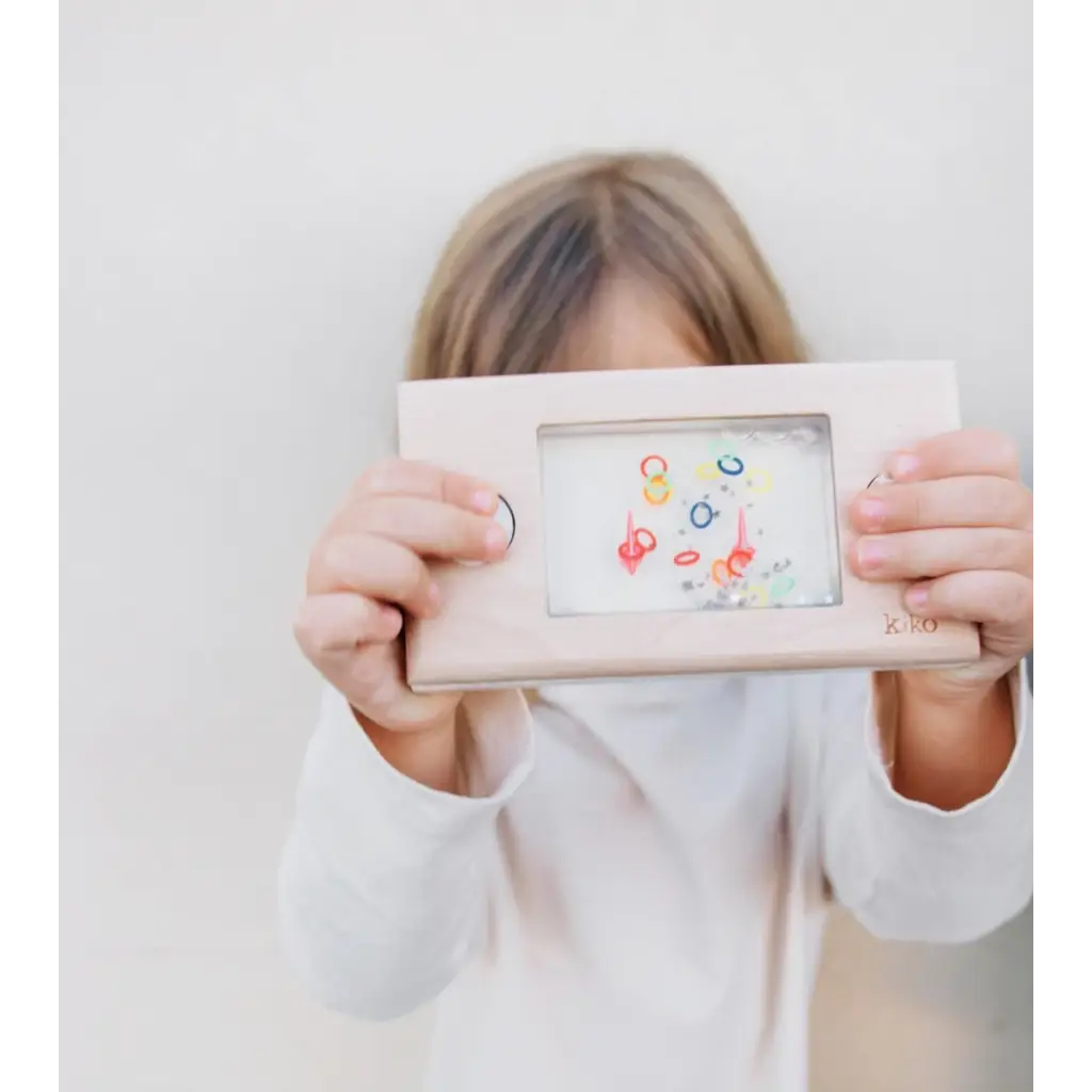 Colorful doodles in a white frame for the Wakka Retro Water Game with Floating Rings