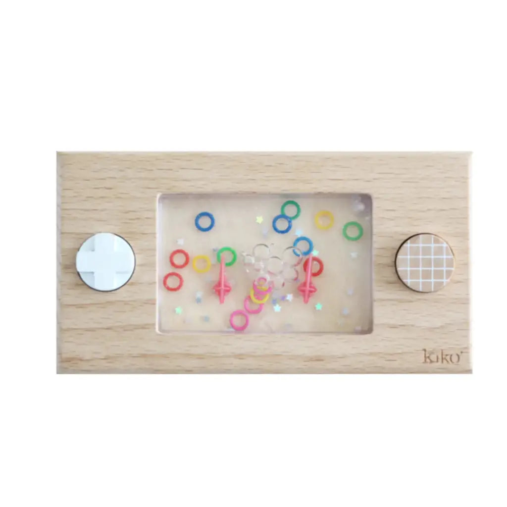 Wooden Wakka Retro Water Game with colorful floating rings behind clear panel