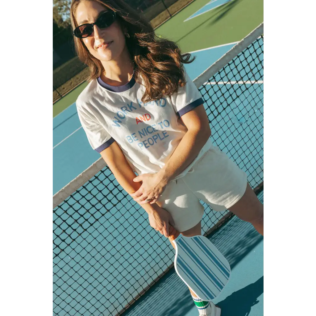 Chill vibes with wave wash fleece shorts on a sunny tennis court day