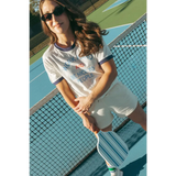 Chill vibes with wave wash fleece shorts on a sunny tennis court day