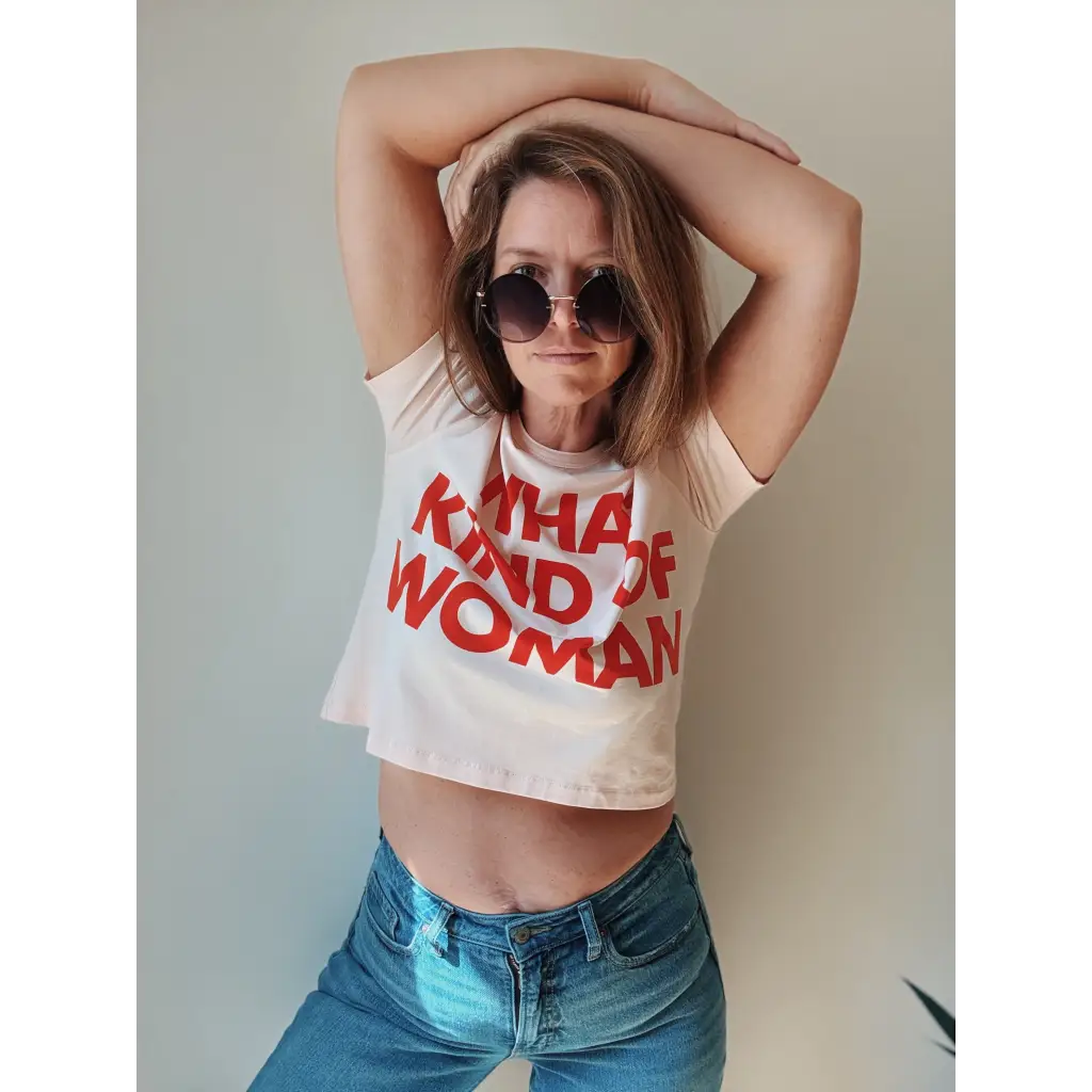 White mom crop t-shirt with red What Kind of Woman text and sunglasses