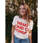 White mom crop t-shirt with red What Kind of Woman text and blue jeans