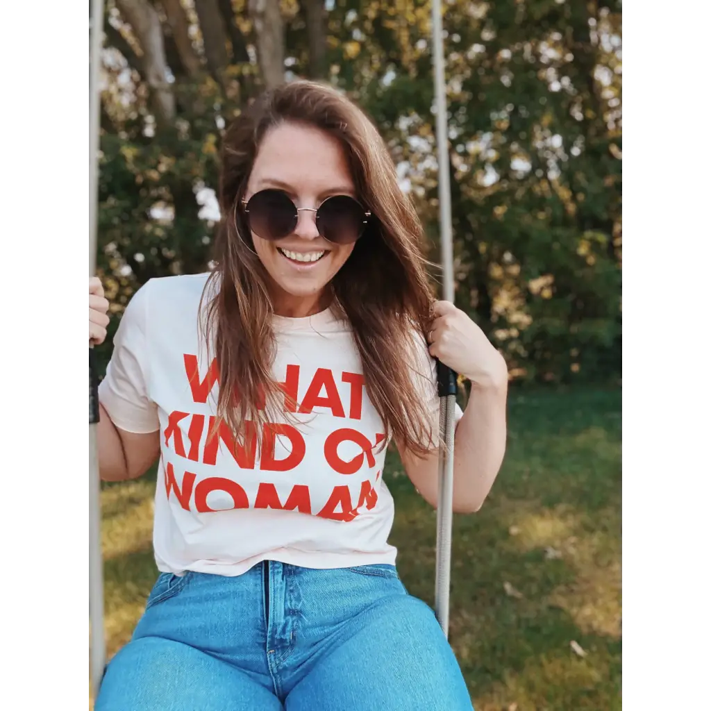 White mom crop t-shirt with red What Kind of Woman text and heart sunglasses
