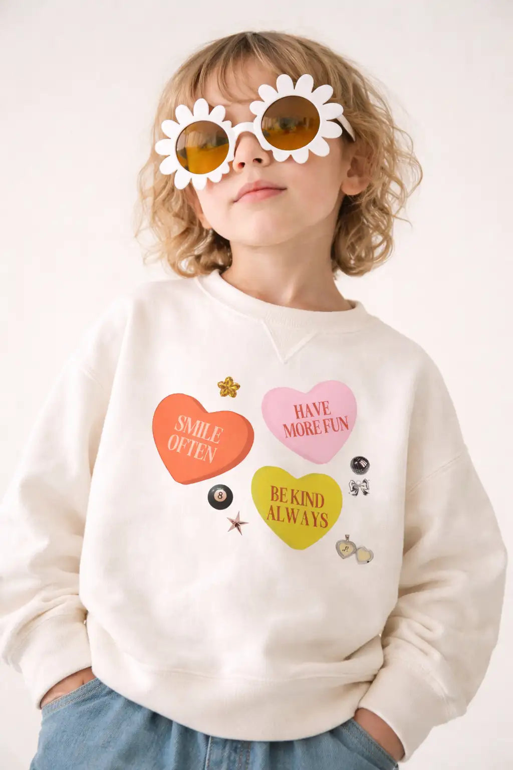 White cotton sweatshirt with colorful heart patches and playful text designs