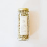 WildFlora Bath Salts Release jar with multicolored salts