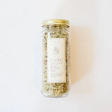 WildFlora Bath Salts Release jar with multicolored salts