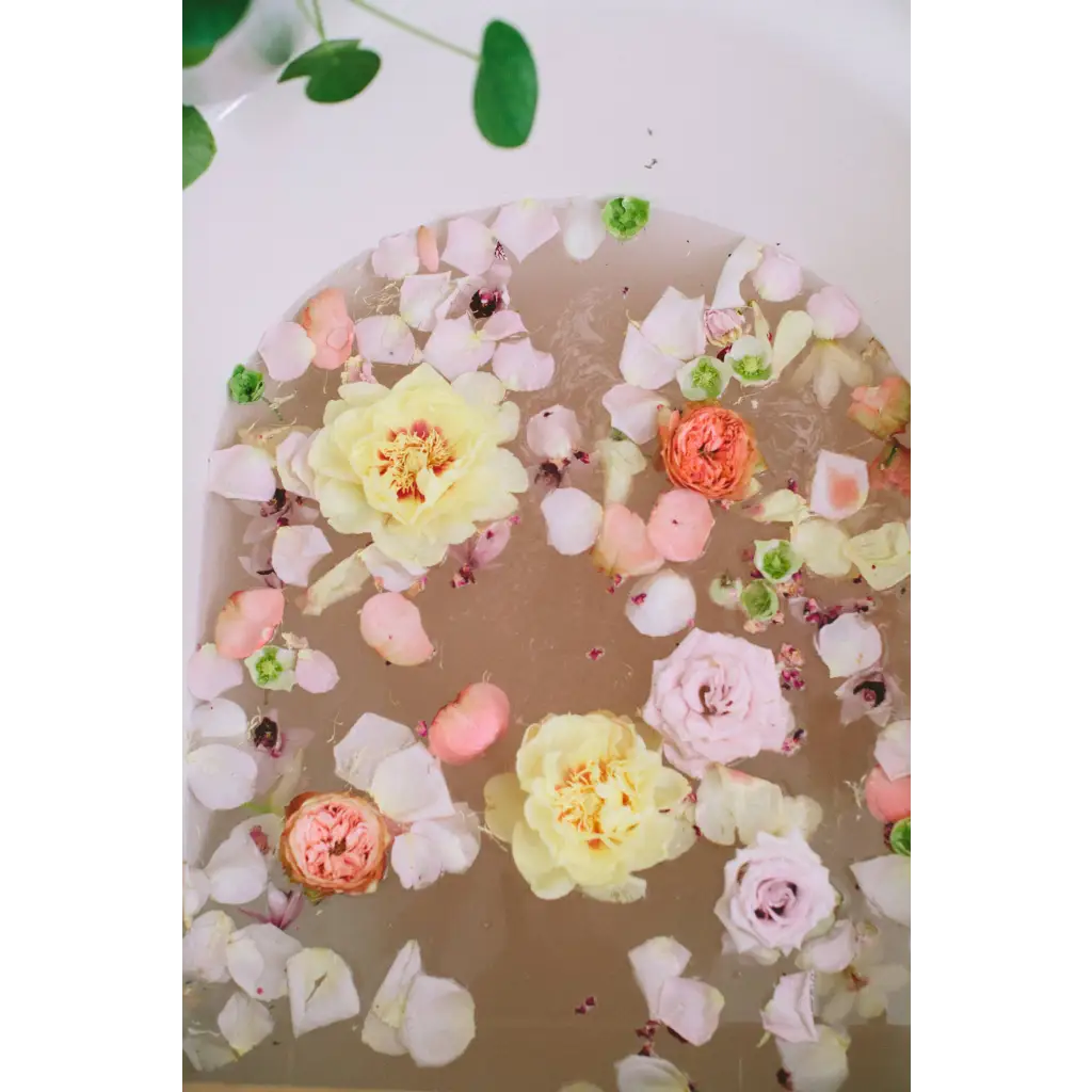 Serene WildFlora bath salts tub with pink yellow peach petals