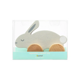 Pale gray wooden bunny push toy teether with orange feet in clear plastic