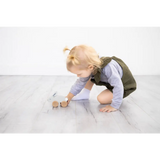 Cute brown wooden bunny push toy car with white wheels and red accents