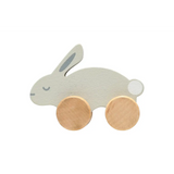 Charming wooden bunny push toy with gold wheels and white accents