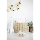 Wooden bunny push toy with woven basket and white interior