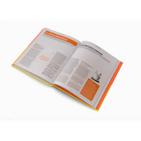 Open book with orange accents showcasing tips on changing conventional habits