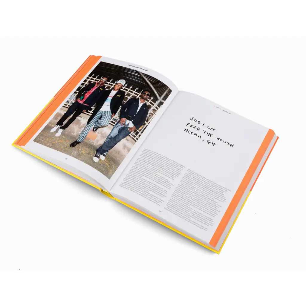 Open book showing photo and text on changing conventional habits with orange accents