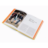 Open book showing photo and text on changing conventional habits with orange accents