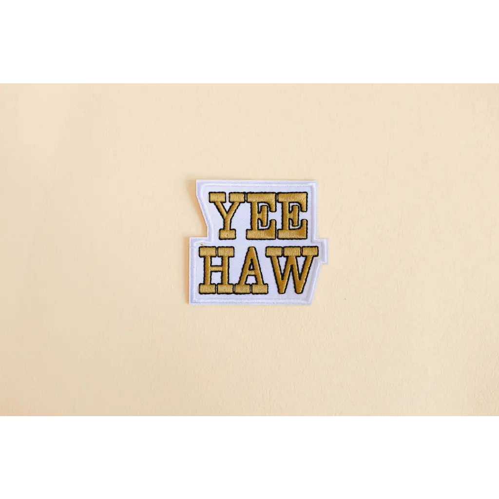 Yellow and black Yeehaw iron-on patch for a fun retro western vibe sticker