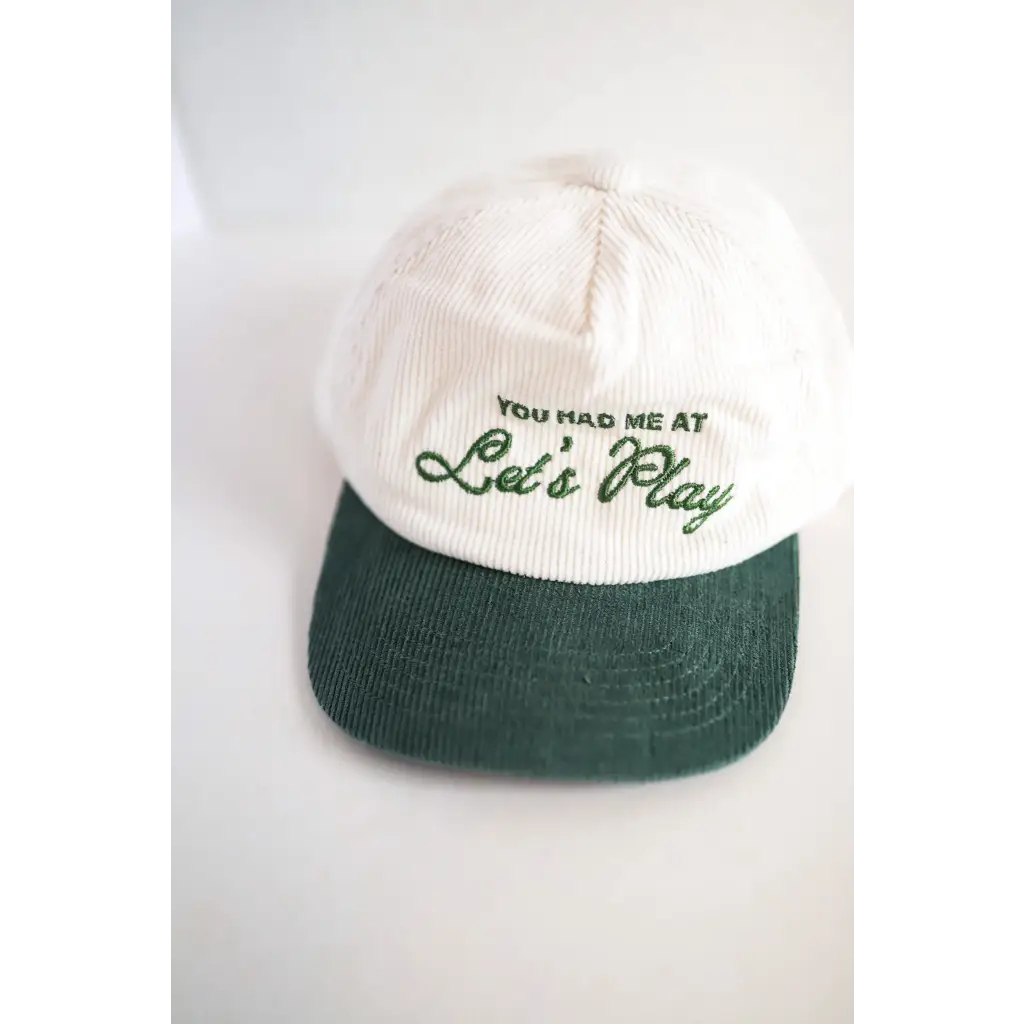 White and green kids trucker hat with You had me at Let’s Play embroidery for fun